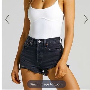 501 Levi’s black shorts mid rise. Almost brand new.